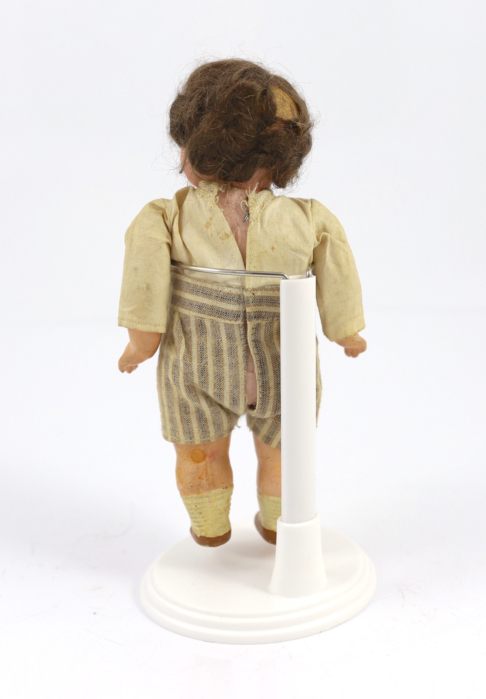 An Armand Marseille bisque character doll, German, circa 1925, 7.5in.